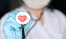 Doctor holding heart shape stestoscope
