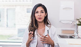 female physician giving an explanation