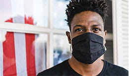 Young black male wearing a mask