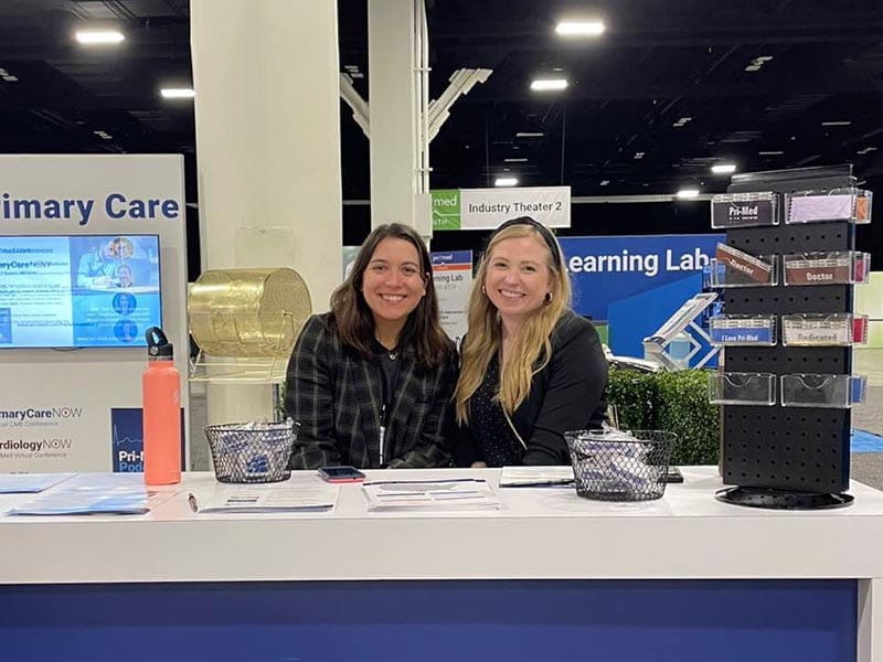 Employees at Pri-Med event booth