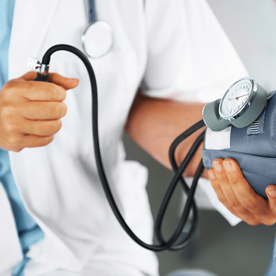Clinician taking blood pressure
