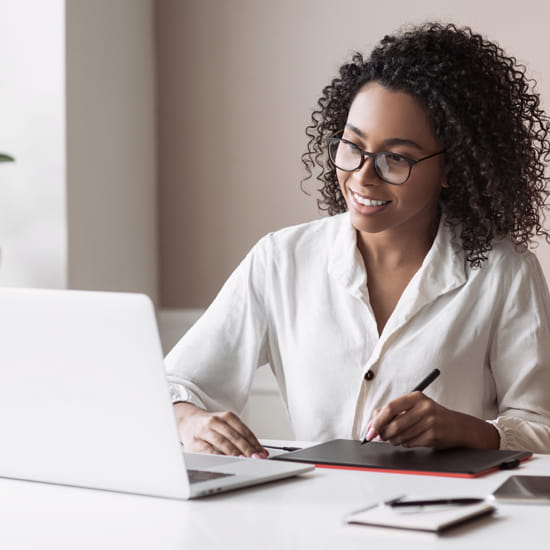 African American woman on laptop computer