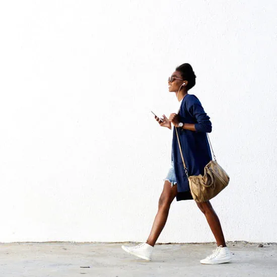 Woman walking white background
