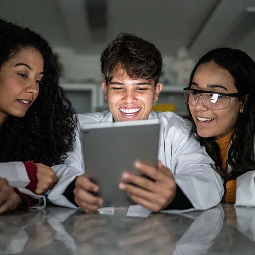 Medical students looking at an ipad