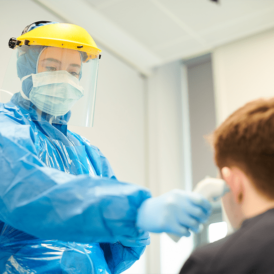 taking temperature with ppe on