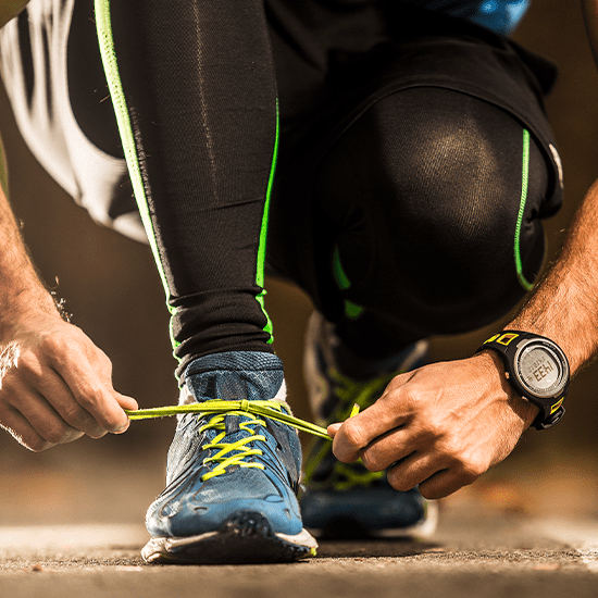 Close up of someone tying their shoe