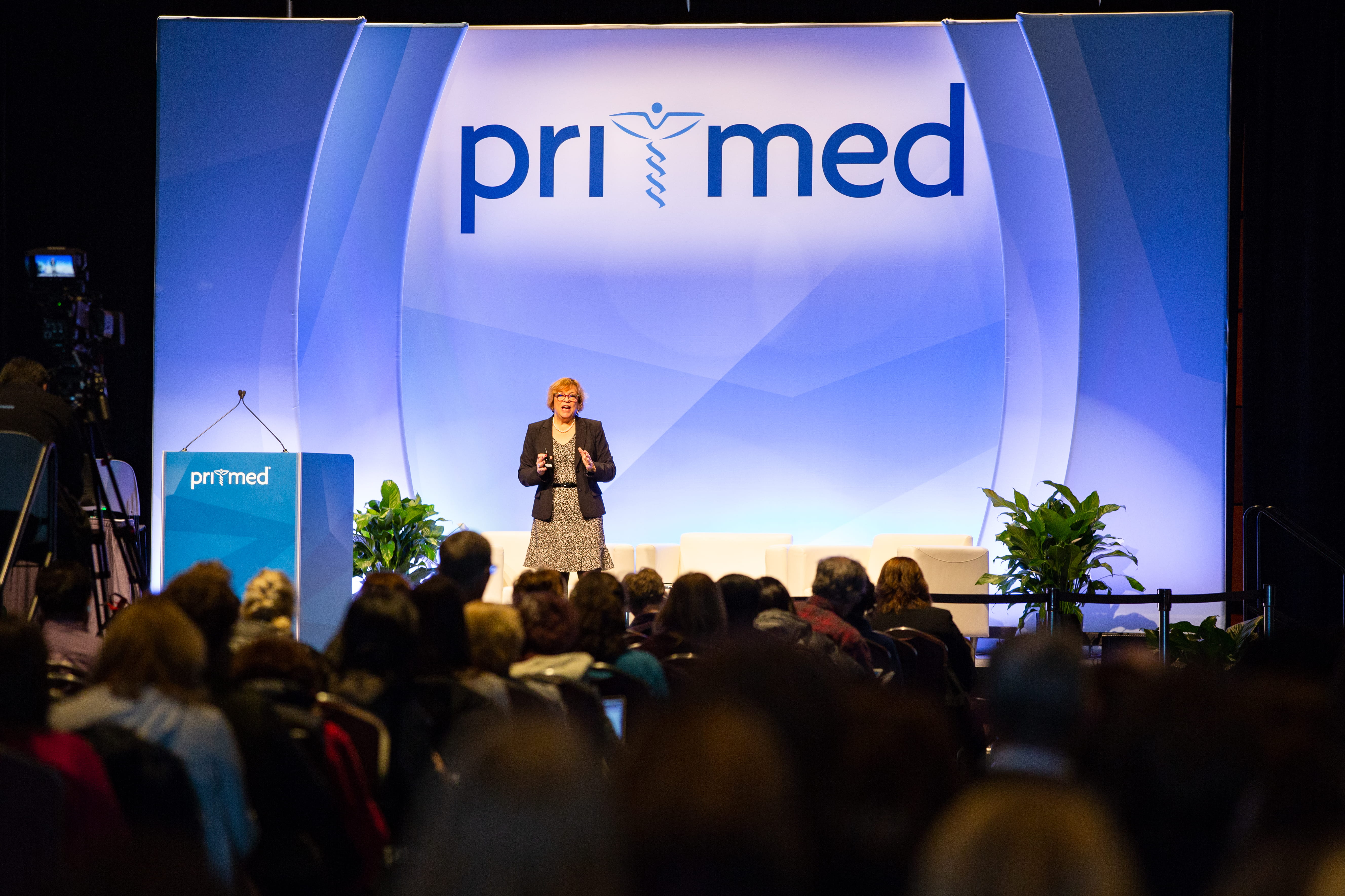 faculty on stage at Pri-Med Southwest CME/CE Conference