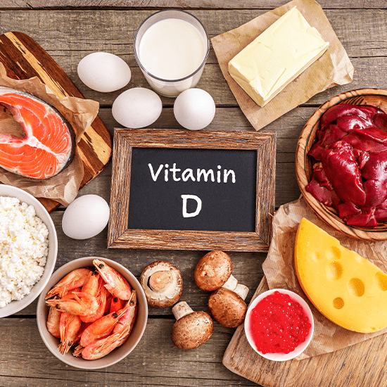 vitamin d sign surrounded by nutrient rich food