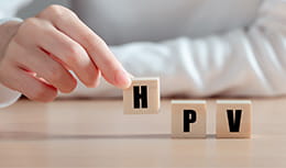 HPV (Human Papillomavirus) acronym on wood block