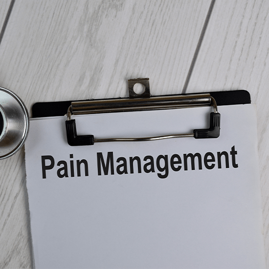 pain management text on clipboard