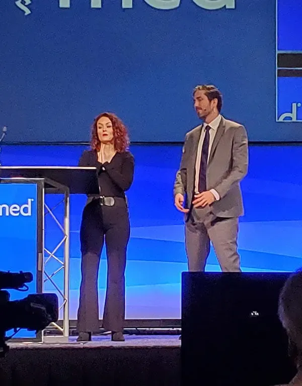 Will Flanary, MD, and Kristin Flanary, MA, on stage