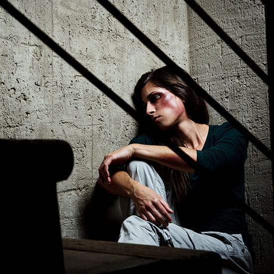 Domestic violence victim in stairwell