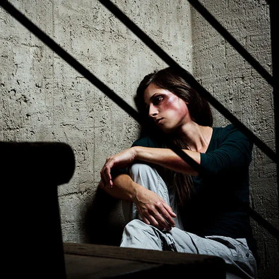 Domestic violence victim in stairwell