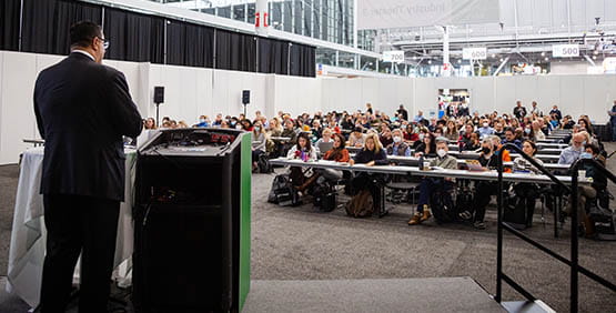 industry theater with audience and speaker