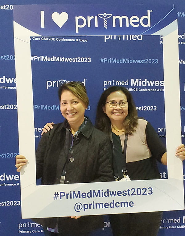 Clinicians posing at Pri-Med Midwest