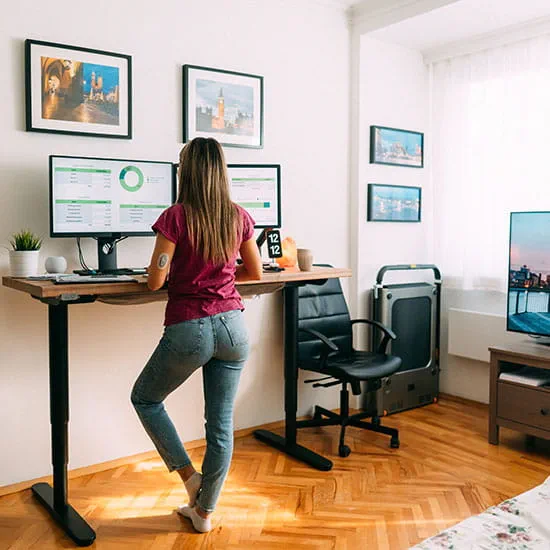 woman working at a standing desk