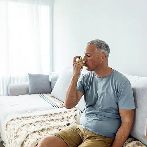 Man with inhaler