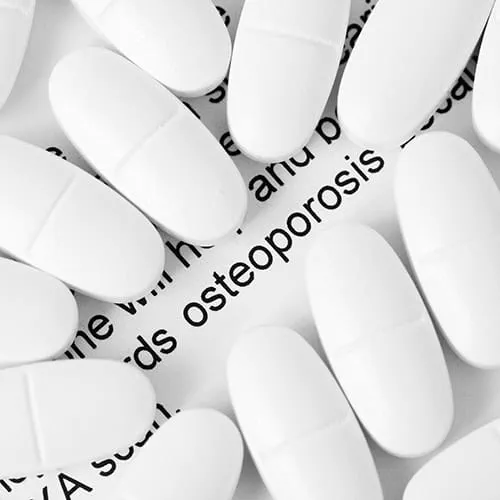 Image of osteoporosis and calcium pills