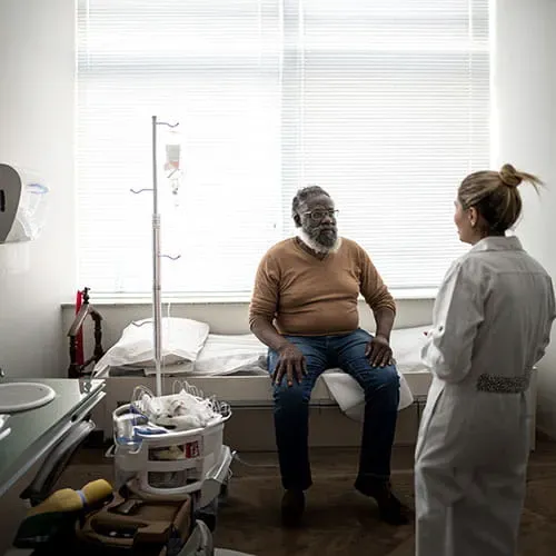 Doctor talking to patient at medical appointment