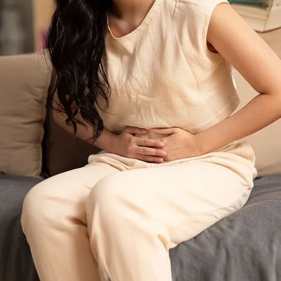 Woman holding her stomach