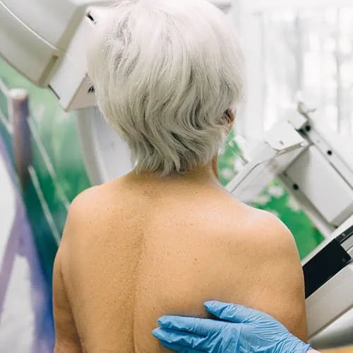Woman receiving a mammogram