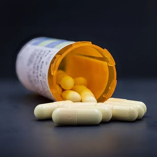pills falling from pill bottle