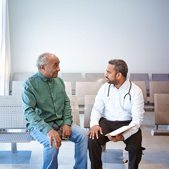 Doctor speaking to a patient
