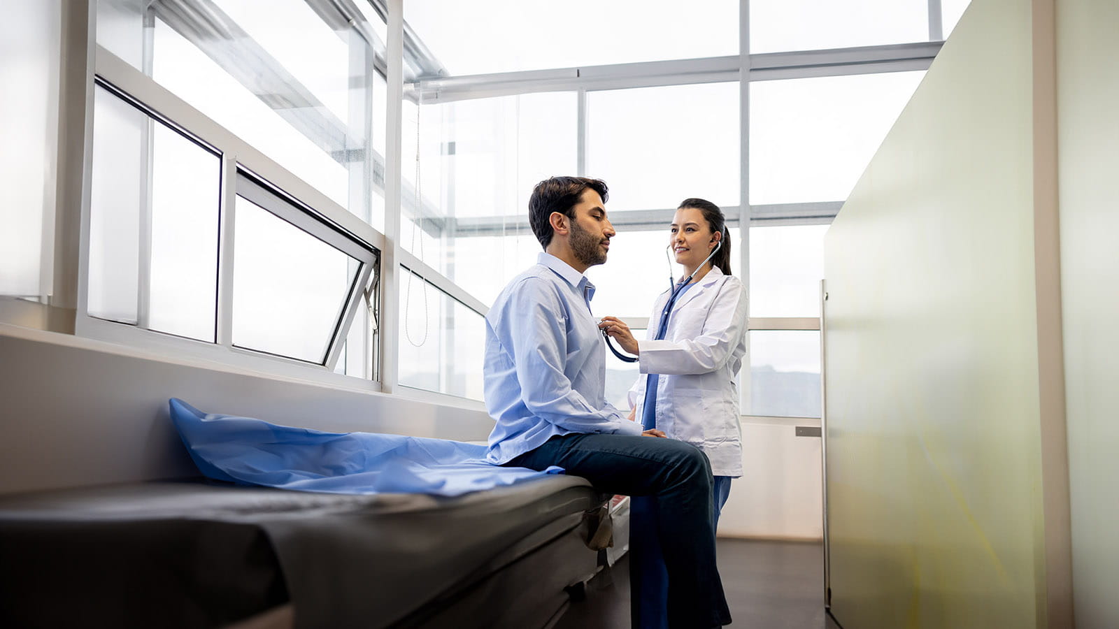 Doctor listening to a patient's heart