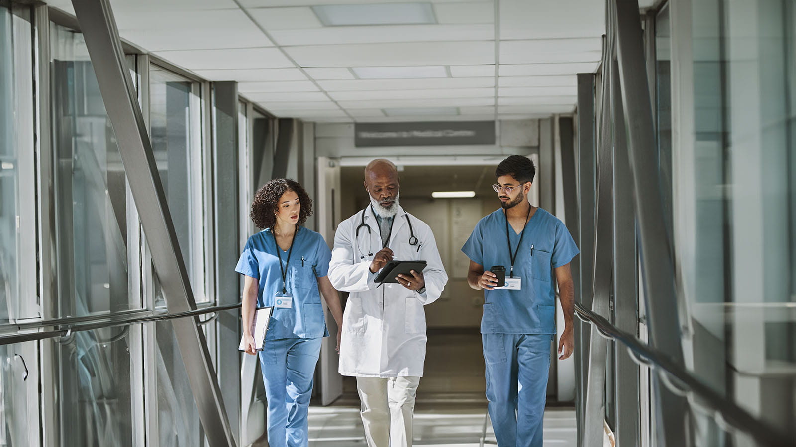 Medical workers walking down hallway