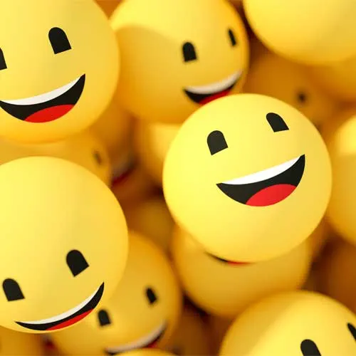 3d rendering of emoji with happy face. large group of objects.