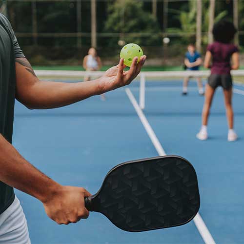People playing pickleball
