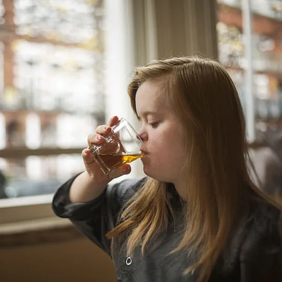 girl drinking apple juice