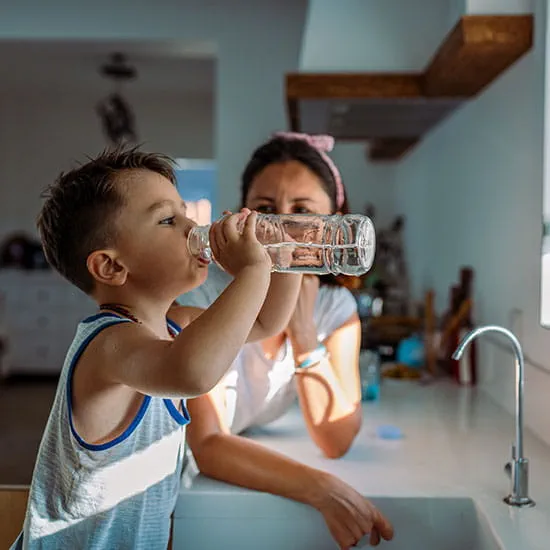 boy drinking water
