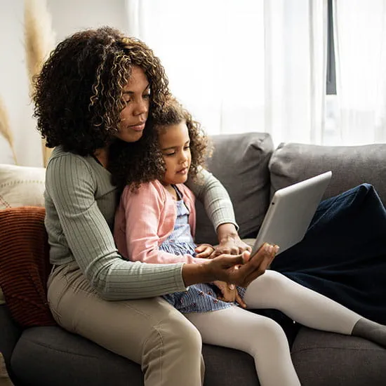 mom and child with tablet