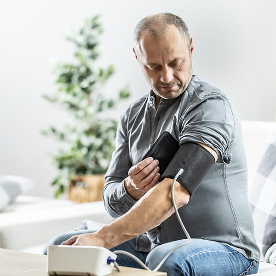 man taking his blood pressure