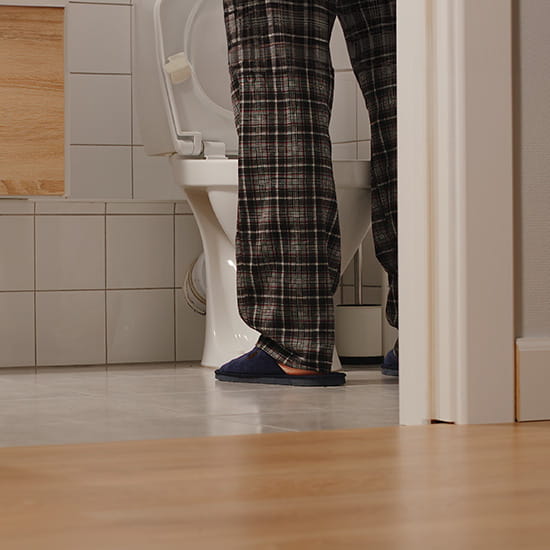 man standing in bathroom