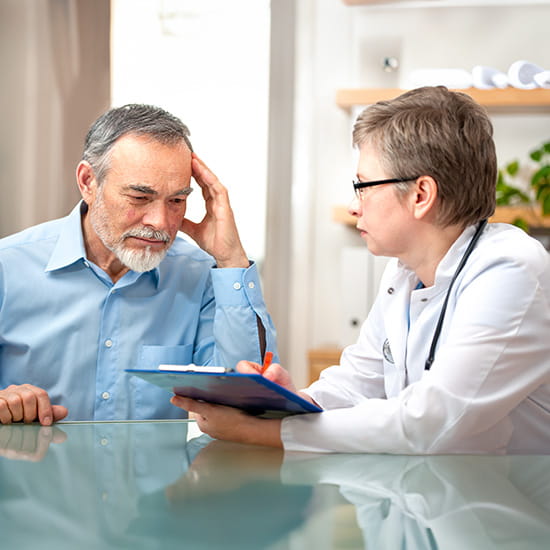 older male patient with doctor