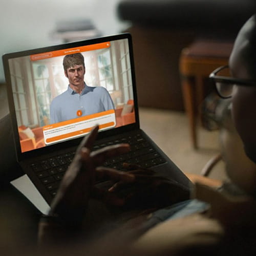 Person taking a course on a computer 