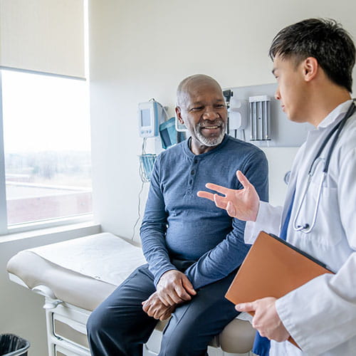 Doctor meeting with a patient in a medical office