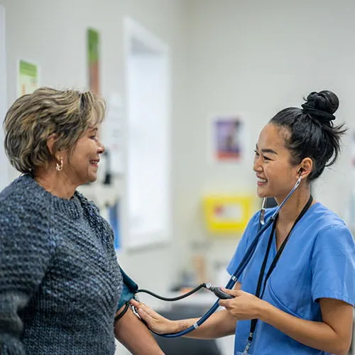 Nurse measuring a patient's blood pressure