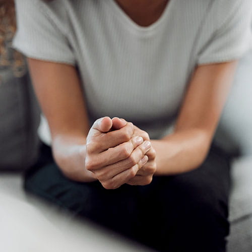 Woman holding her hands