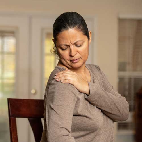 Latin woman with shoulder pain