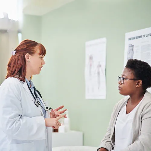 Doctor meeting with a patient in a doctor's office