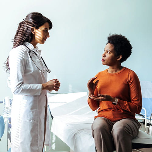 doctor talking to patient