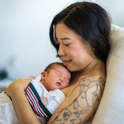 woman holding infant