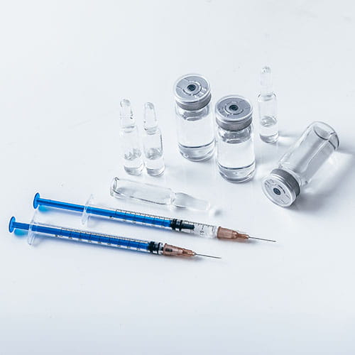 vaccine syringe and vials