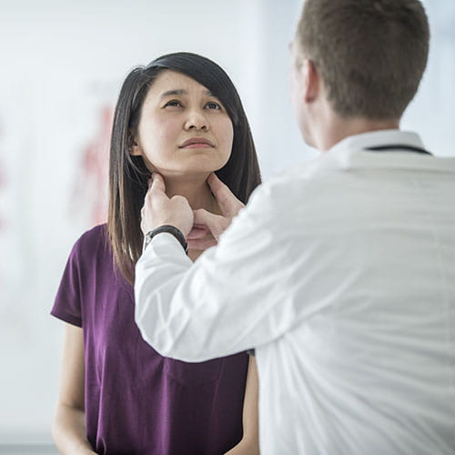 doctor examining patient