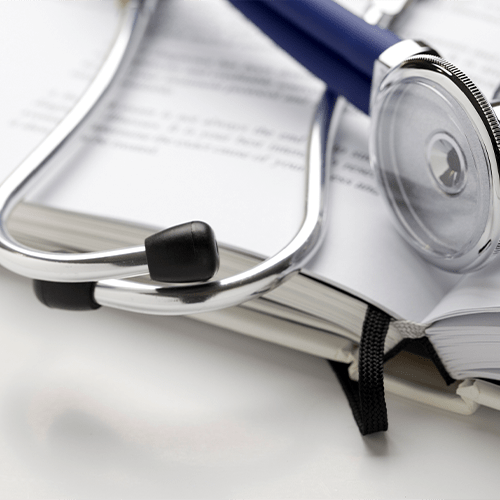 Stethoscope on book. All text was written by photographer and is copyright free.