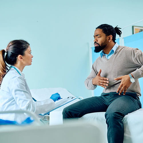 Man talking about his health with a clinician
