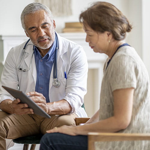 Doctor sharing medical results with a patient